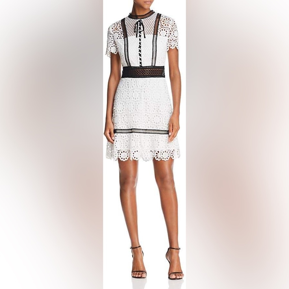 Elegant White Lace Dress with Black Accents